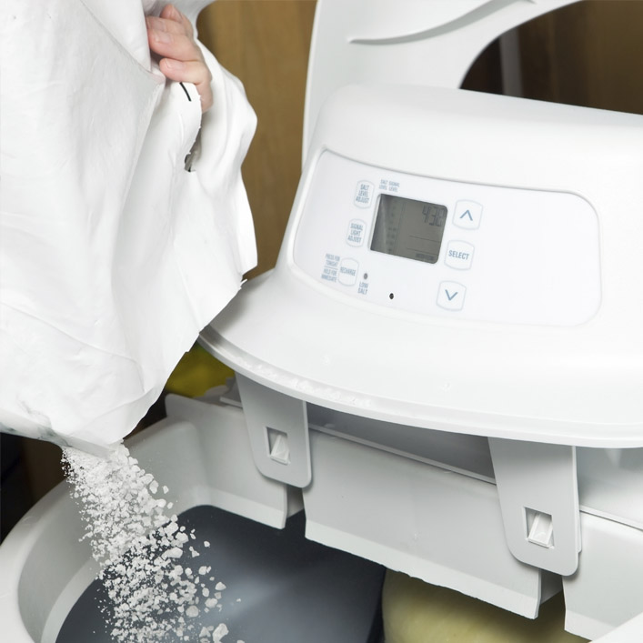 pour salt in water softener maintenance